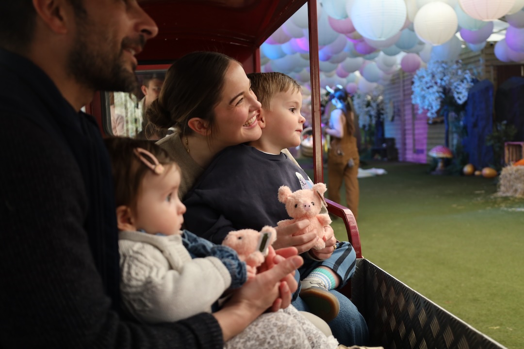 Family on a train, looking at an Easter show