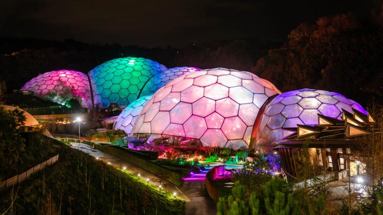 Colourfully illuminated Biomes at the Eden Project in Cornwall